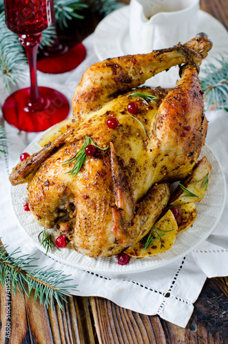 Christmas chicken baked with potatoes and cranberries