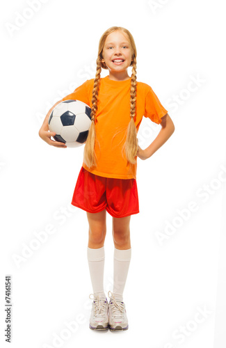Little blond girl holding soccer ball isolated © Sergey Novikov