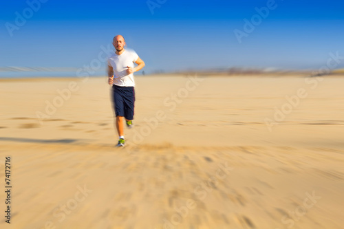 Man running in the beach