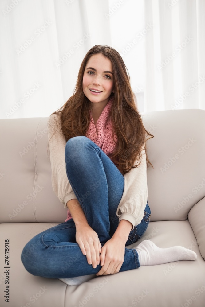 Pretty brunette smiling at camera