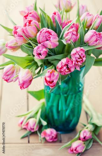 Fototapeta Naklejka Na Ścianę i Meble -  Bouquet of beautiful pink tulips in vase