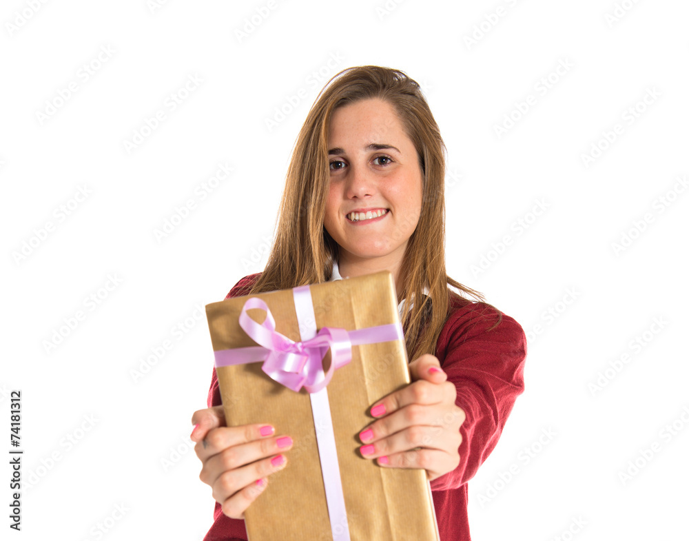 Student giving a present over white background Student giving a present over white background