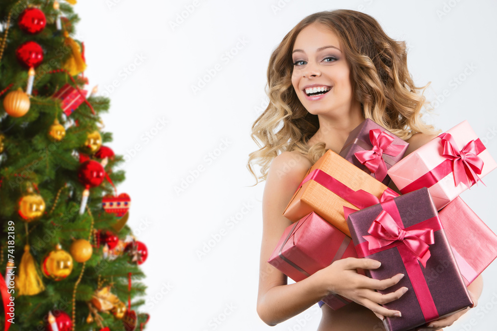 Portrait of beautiful happy girl with box of Christmas gift Portrait of beautiful happy girl with box of Christmas gift