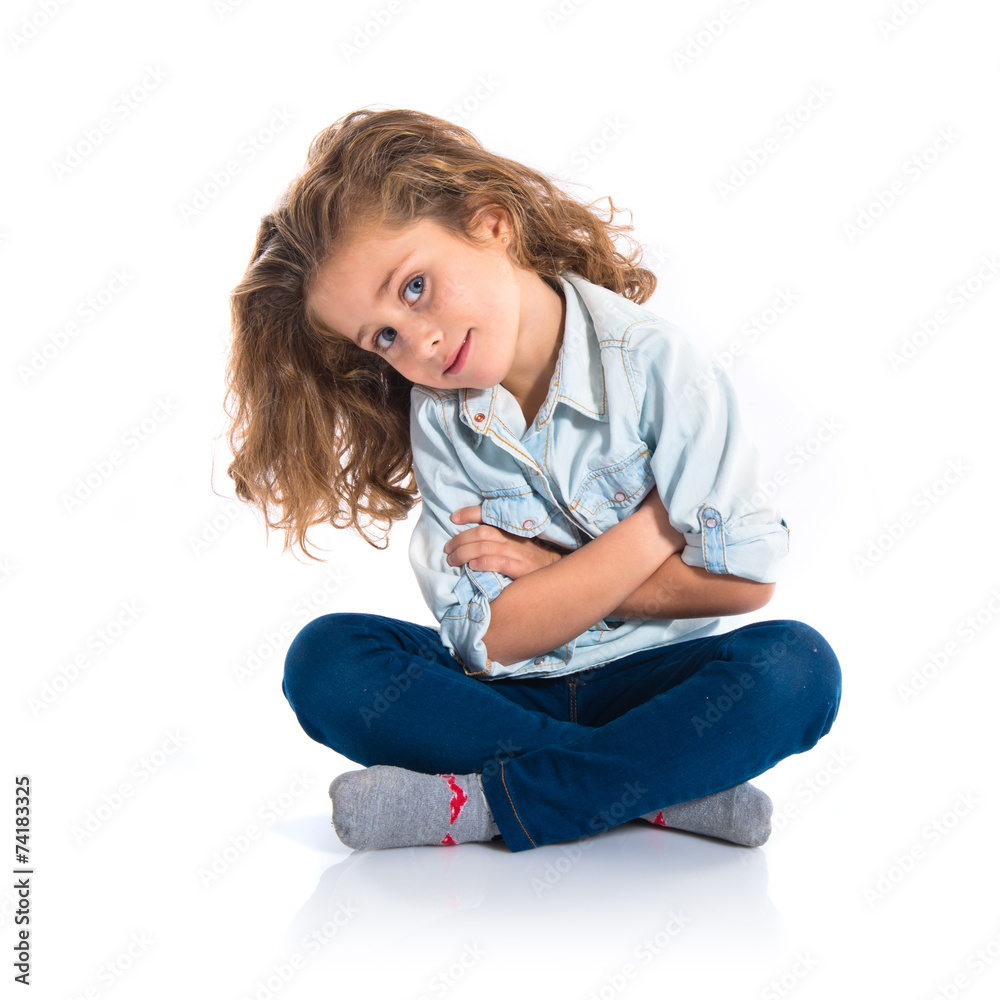 Little girl with her arms crossed