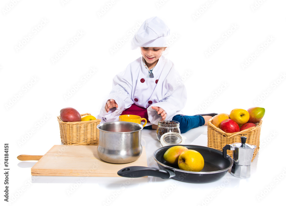 Blonde little girl dressed like chef Blonde little girl dressed like chef