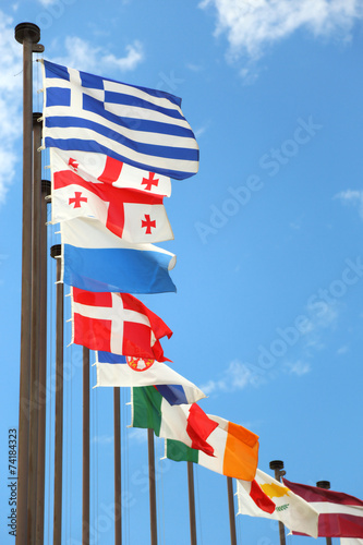 international flags against the sky