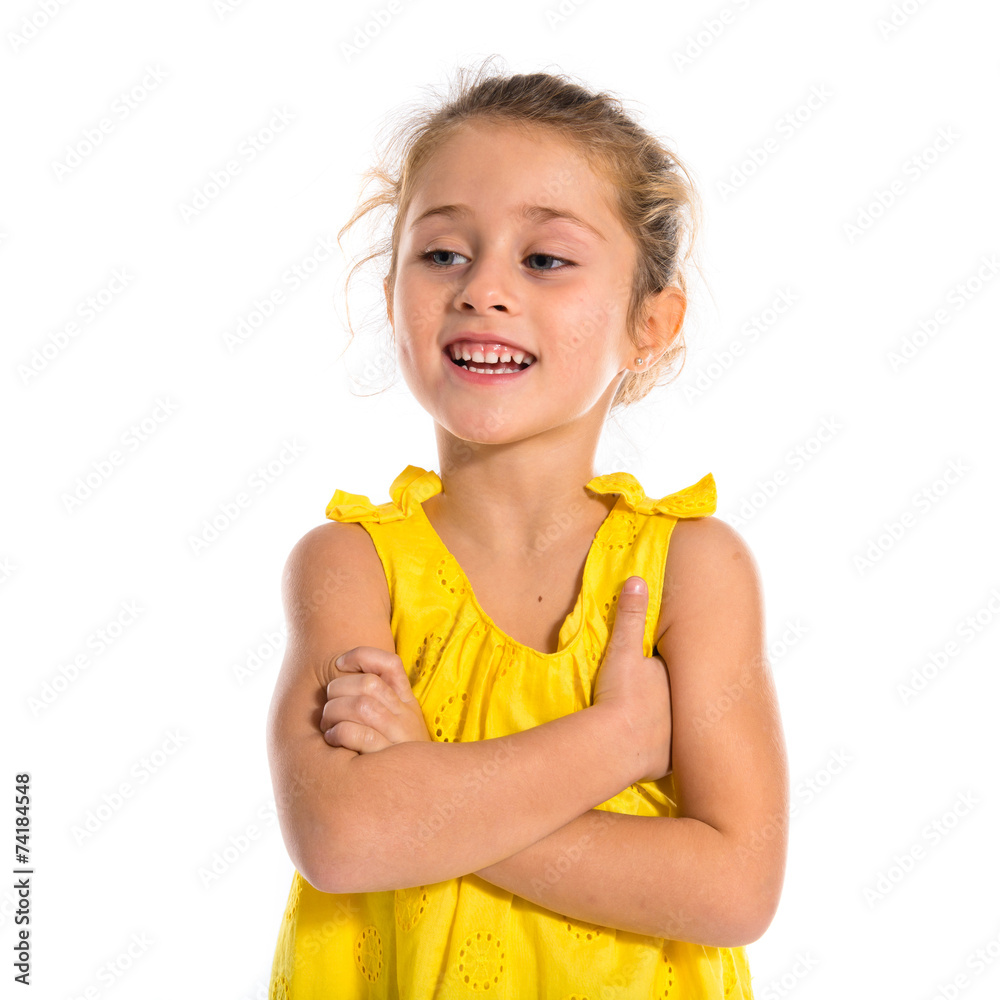 Blonde little girl with her arms crossed Blonde little girl with her arms crossed
