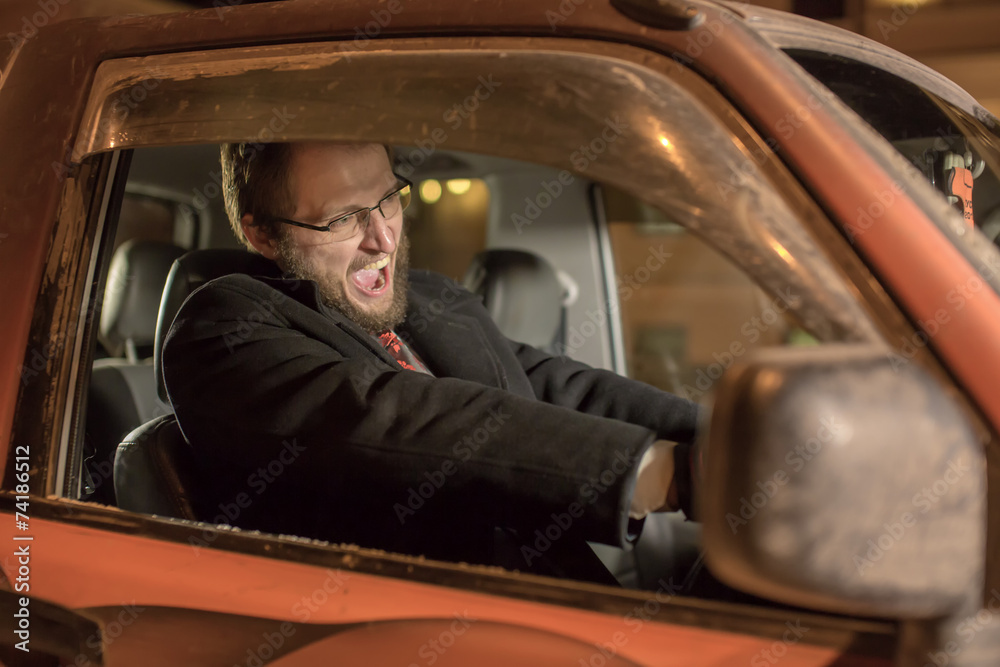 The man at the wheel the car The man at the wheel the car