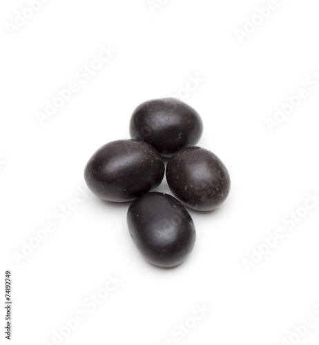 peanuts in chocolate on the white background