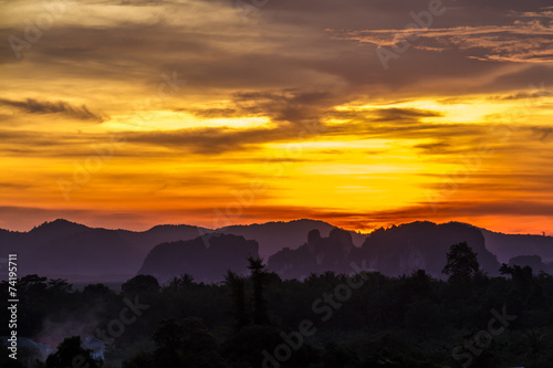 mountains and golden evening light. © nitimongkolchai