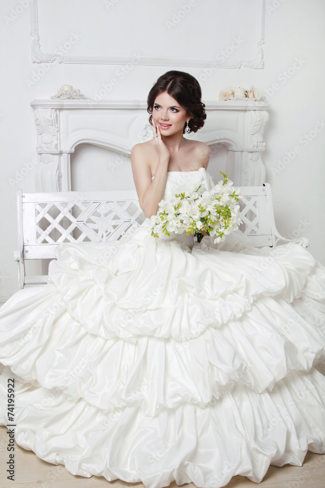 Beautiful attractive bride in wedding luxurious dress with volum Beautiful attractive bride in wedding luxurious dress with volum