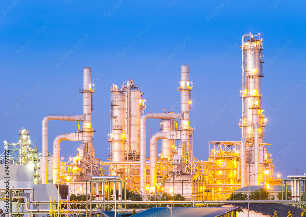 Obraz premium Oil gas refinery plant. May called petroleum, production or petrochemical plant. Industrial factory construction from engineering technology with steel pipe, pipeline, tank. Business for power energy.