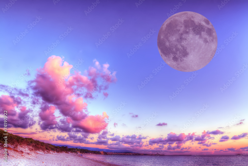 Naklejka premium huge moon over the shore