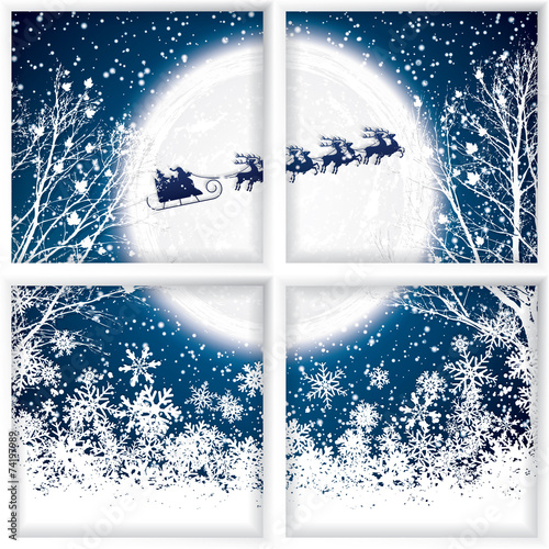 Santa Claus rides in a reindeer sleigh