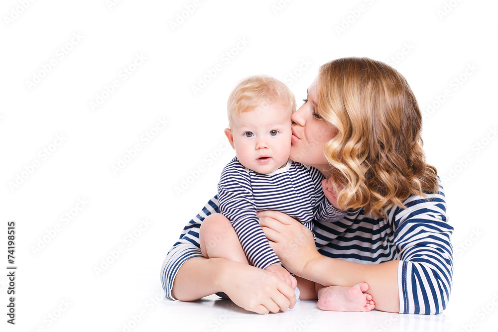 Young mother playing with her little son. Young mother playing with her little son.