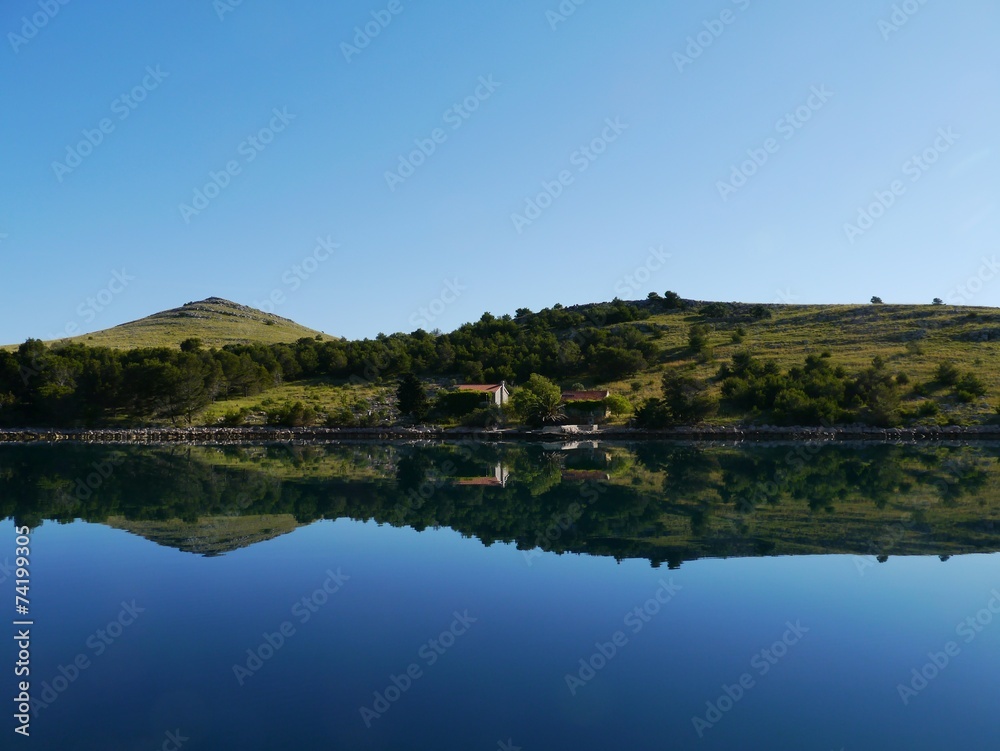 The mirroring in the Adriatiac sea of Kornat in Croatia