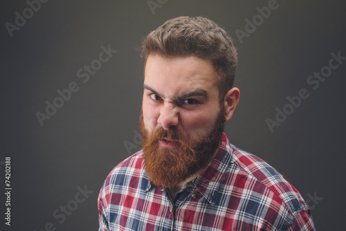 Angry bearded man portrait