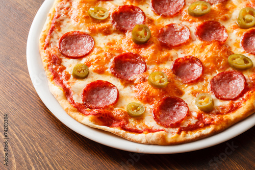 pizza on wood background