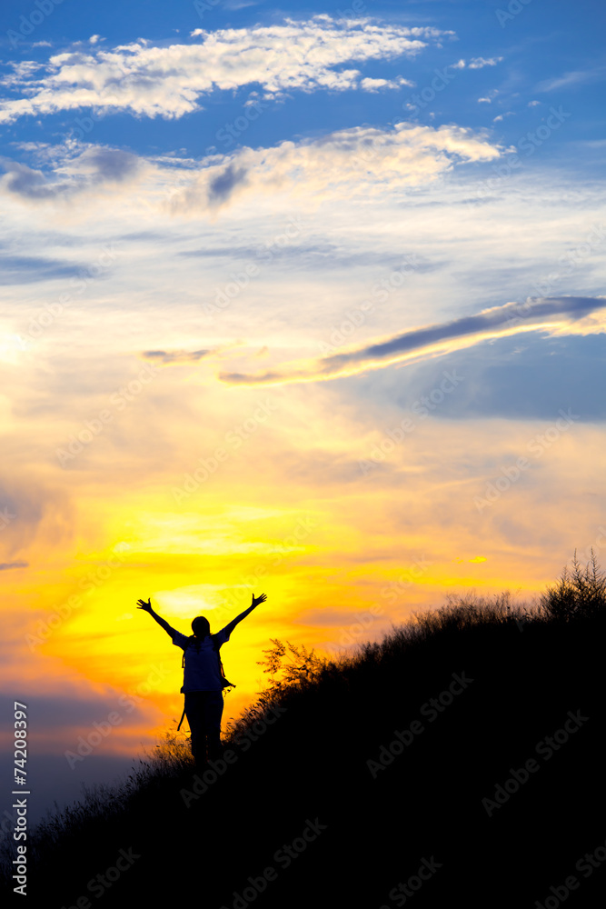 Mountain hiker in front of sunset Mountain hiker in front of sunset