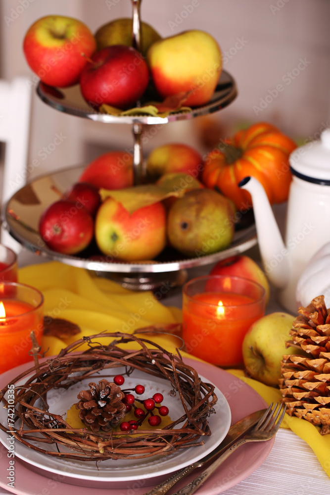 Festive autumn serving table in room Festive autumn serving table in room