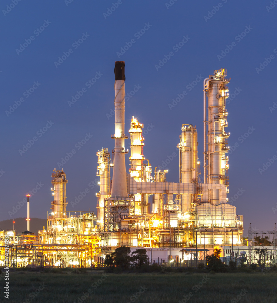 Oil refinery at twilight sky