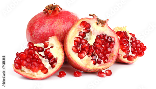 Juicy ripe pomegranates, isolated on white