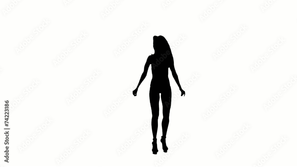 Dancing gogo girl silhouette on a white background. Slow motion. Dancing gogo girl silhouette on a white background. Slow motion.