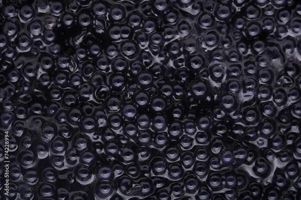 Black caviar background, top view Black caviar background, top view