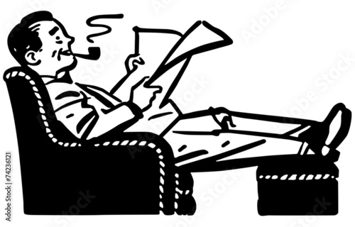 Man Relaxing In Easy Chair