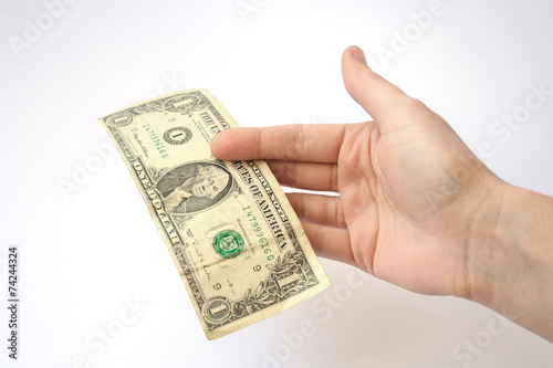 hand on a white background stretches of banknotes in denominatio photo