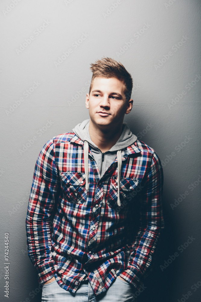 Nonchalant sexy good-looking young man