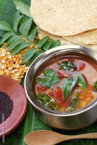 tomato rasam, south indian soup photo