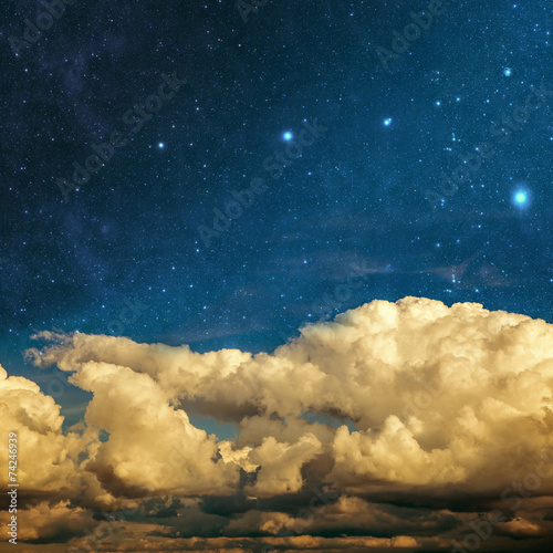 Fototapeta Naklejka Na Ścianę i Meble -  clouds and stars on a textured vintage paper  background