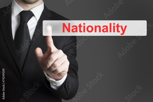 businessman pushing button nationality