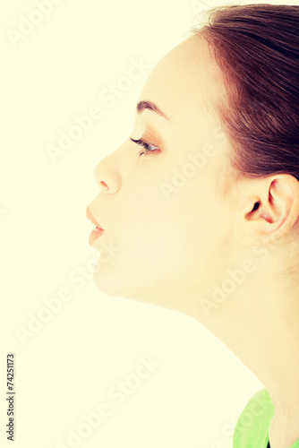 Attractive woman's profile. Closeup.