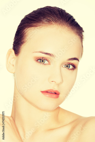 Beautiful young woman with healthy clean skin.