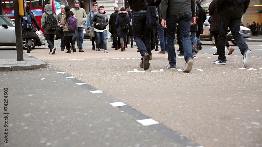 Westminster junction people cross street Westminster junction people cross street