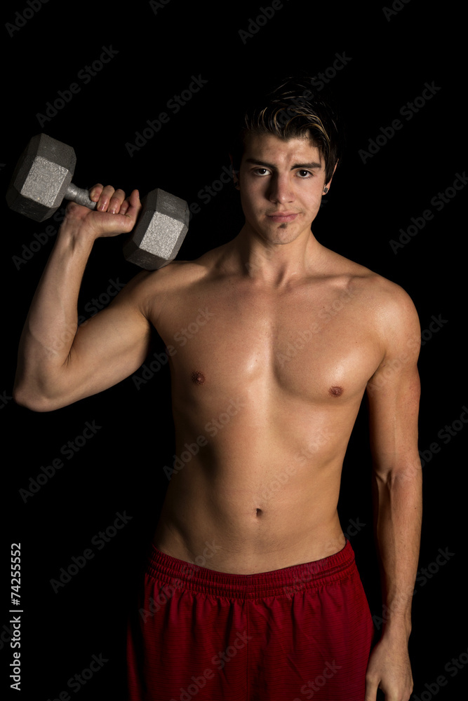 man no shirt red shorts stand on black weight up man no shirt red shorts stand on black weight up