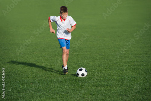 Fototapeta Naklejka Na Ścianę i Meble -  Kids soccer