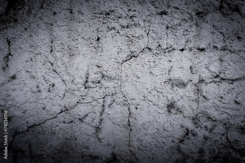 Dark grunge textured wall closeup