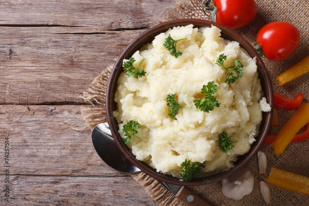 mashed potatoes with parsley closeup. horizontal top view mashed potatoes with parsley closeup. horizontal top view