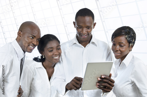 Four african business people with tablet PC photo