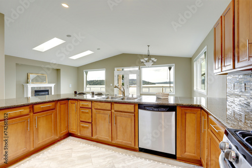 Luxury kitchen room with bright brown cabinets