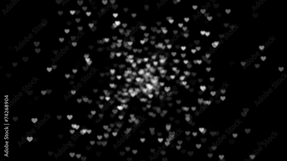 Silver shimmering hearts on black background Silver shimmering hearts on black background