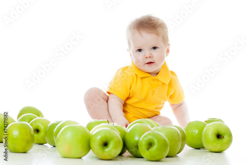 Smiling baby with many gree...