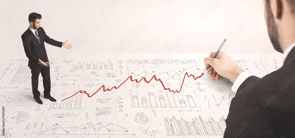 Business man looking at red arrow drawn by a hand Business man looking at red arrow drawn by a hand