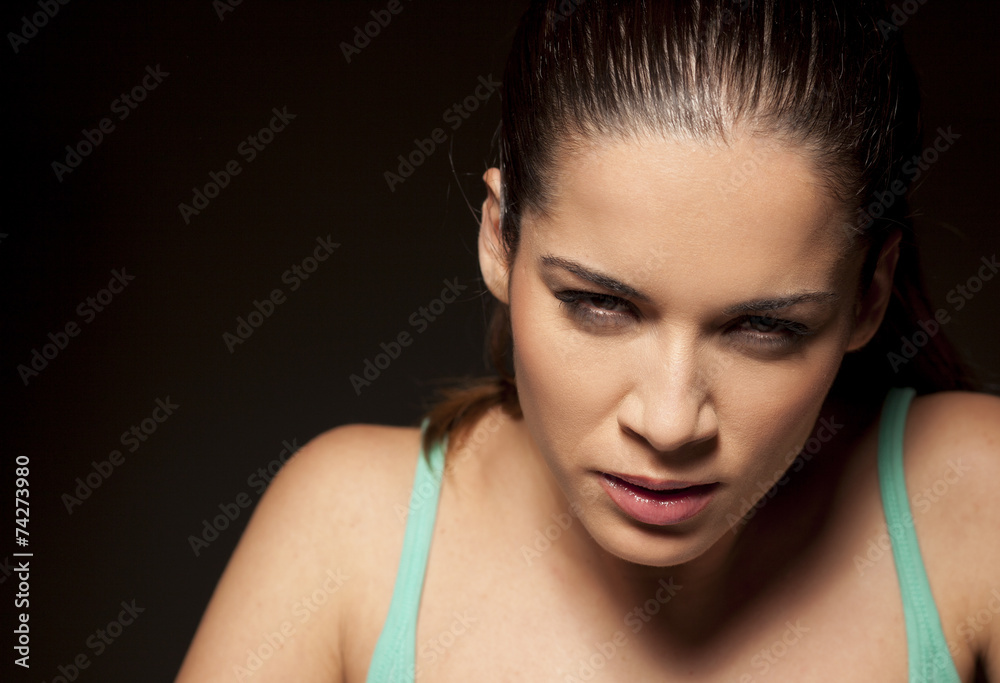 portrait of angry nervous woman on a dark background portrait of angry nervous woman on a dark background