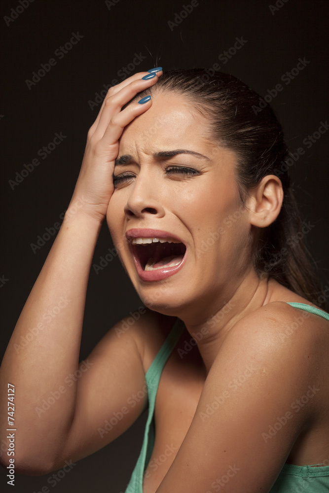 portrait of a young frightened weeping woman portrait of a young frightened weeping woman
