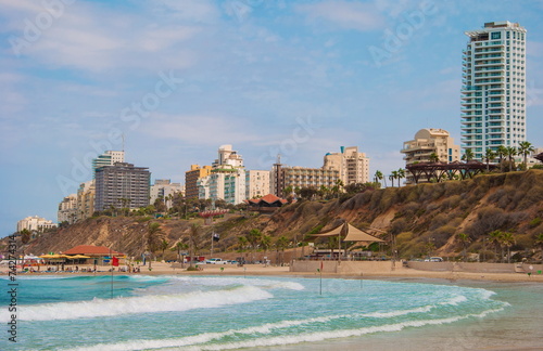View of  beach and  waterfront city of Netanya in Israel photo