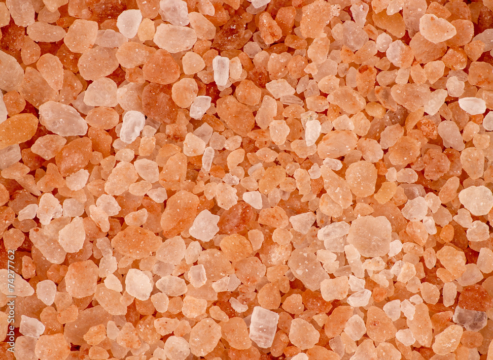 Aerial background macro texture of pink red himalayan salt Aerial background macro texture of pink red himalayan salt